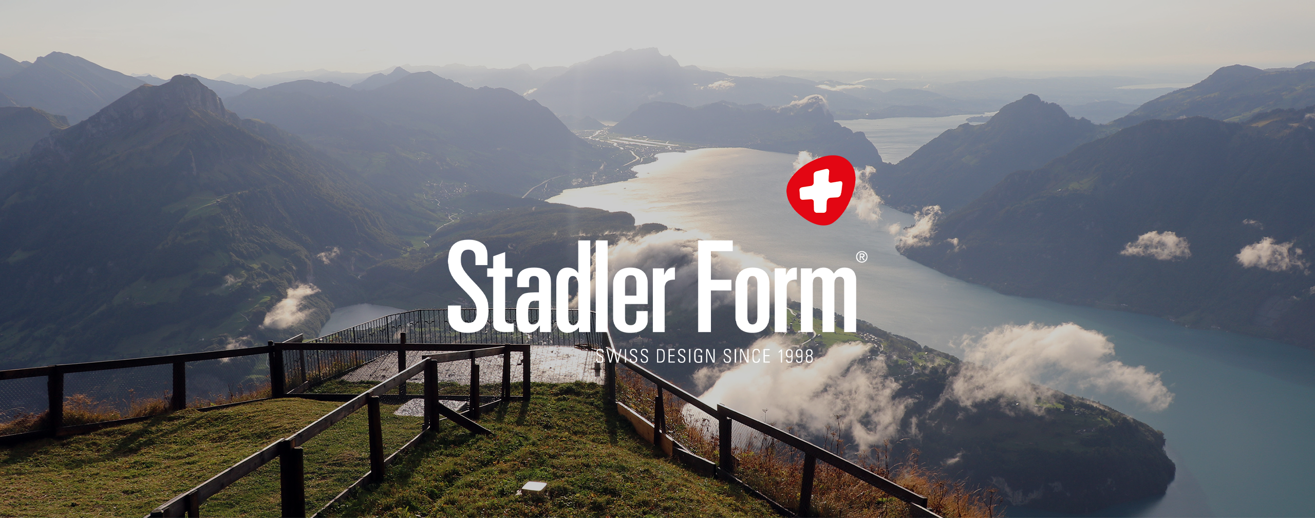 Stadler Form logo with mountains and lakes